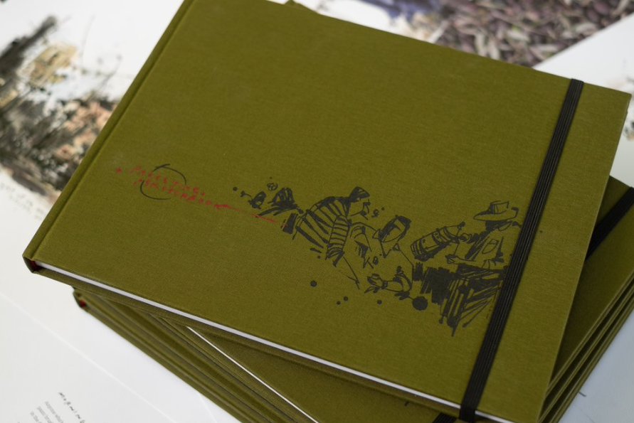 a beautiful hardcover book with black foil on a cloth cover