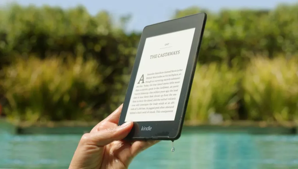 ebook_image an image of a person holding an amazon kindle reader
