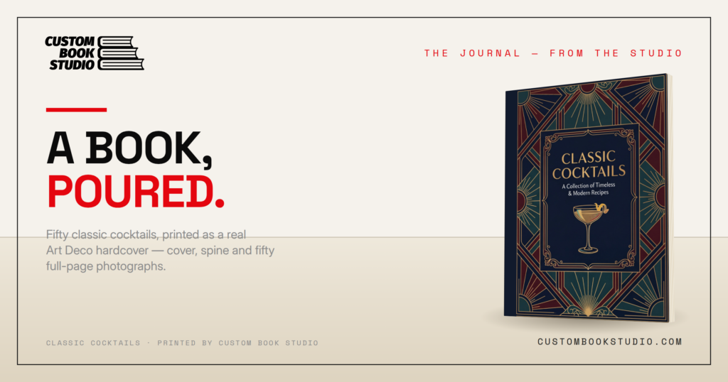 The Classic Cocktails hardcover standing on a table, Custom Book Studio brand featured image
